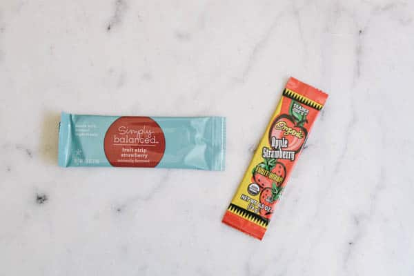 2 Fruit leather snacks on a table. 