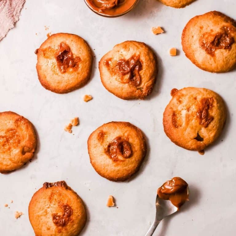 Butterscotch Walnut Cookies laying on a table.