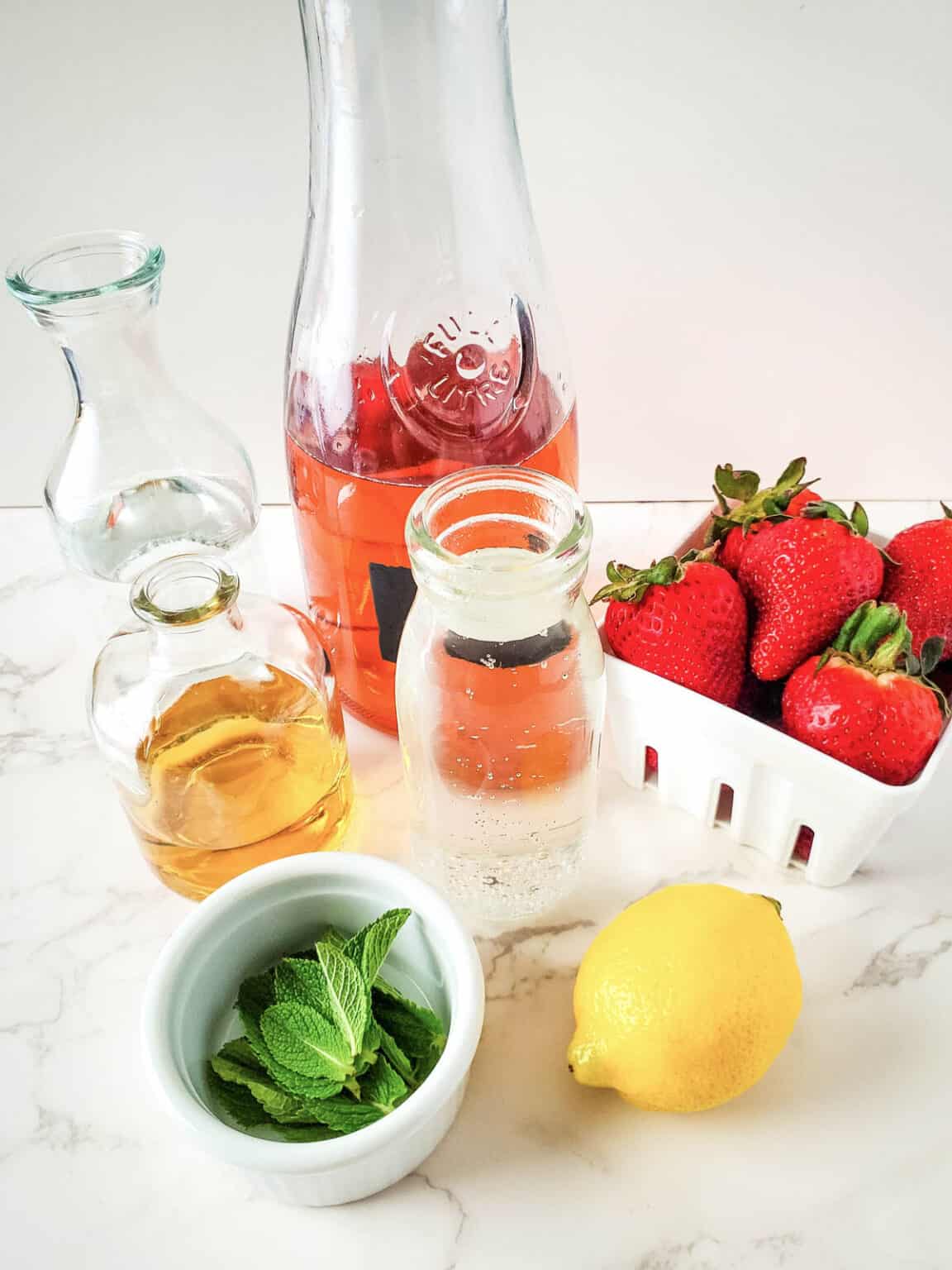 Strawberry Rosé Sangria With Elderflower Cupcakes And Cutlery