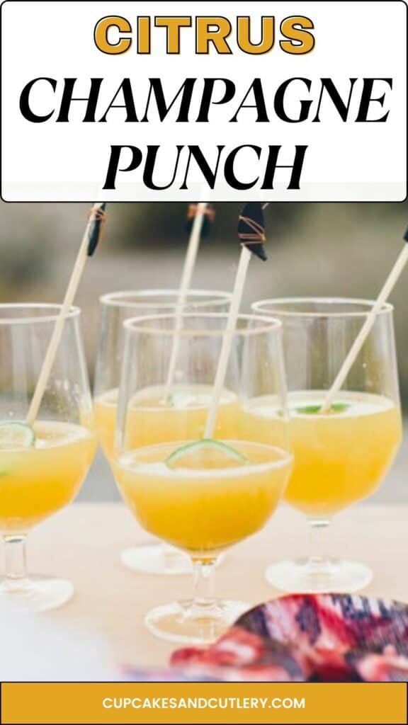 Text: Best champagne punch with a glasses of a citrus punch on a table.